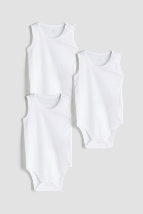 vestido基ico基d para niño基s de LCW en color Ekru, con diseño básico y detalles comfortables.